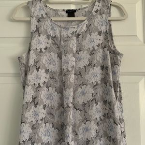 Floral blue and grey shirt.